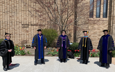 photo of the Academic Deans standing outdoors
