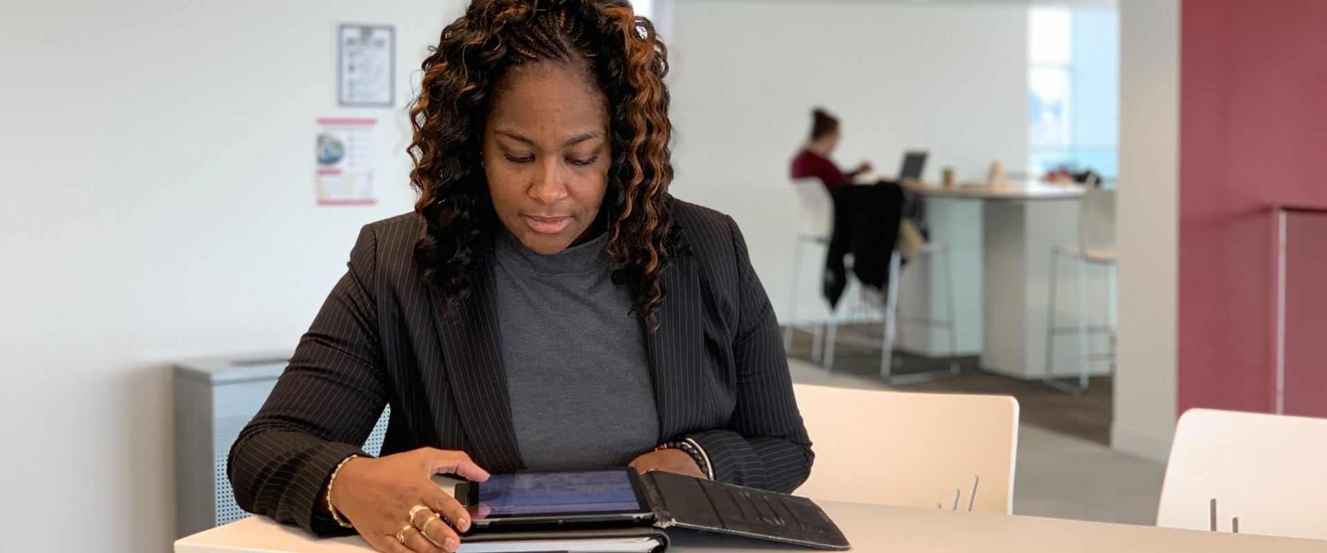 Business woman working on a tablet