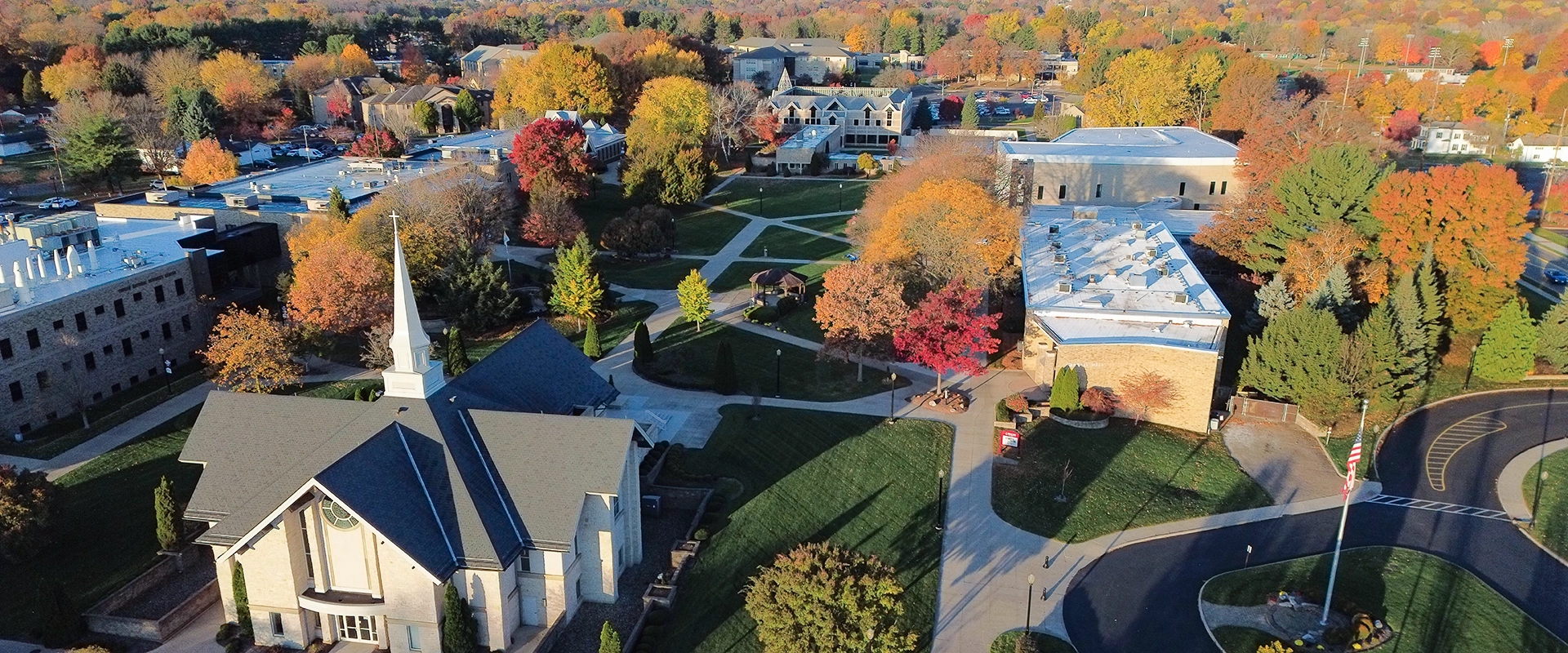 Aerial view of the Walsh campus on a sunny, early morning day