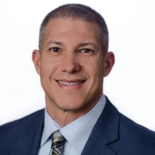 Professional headshot of Mario Giganti