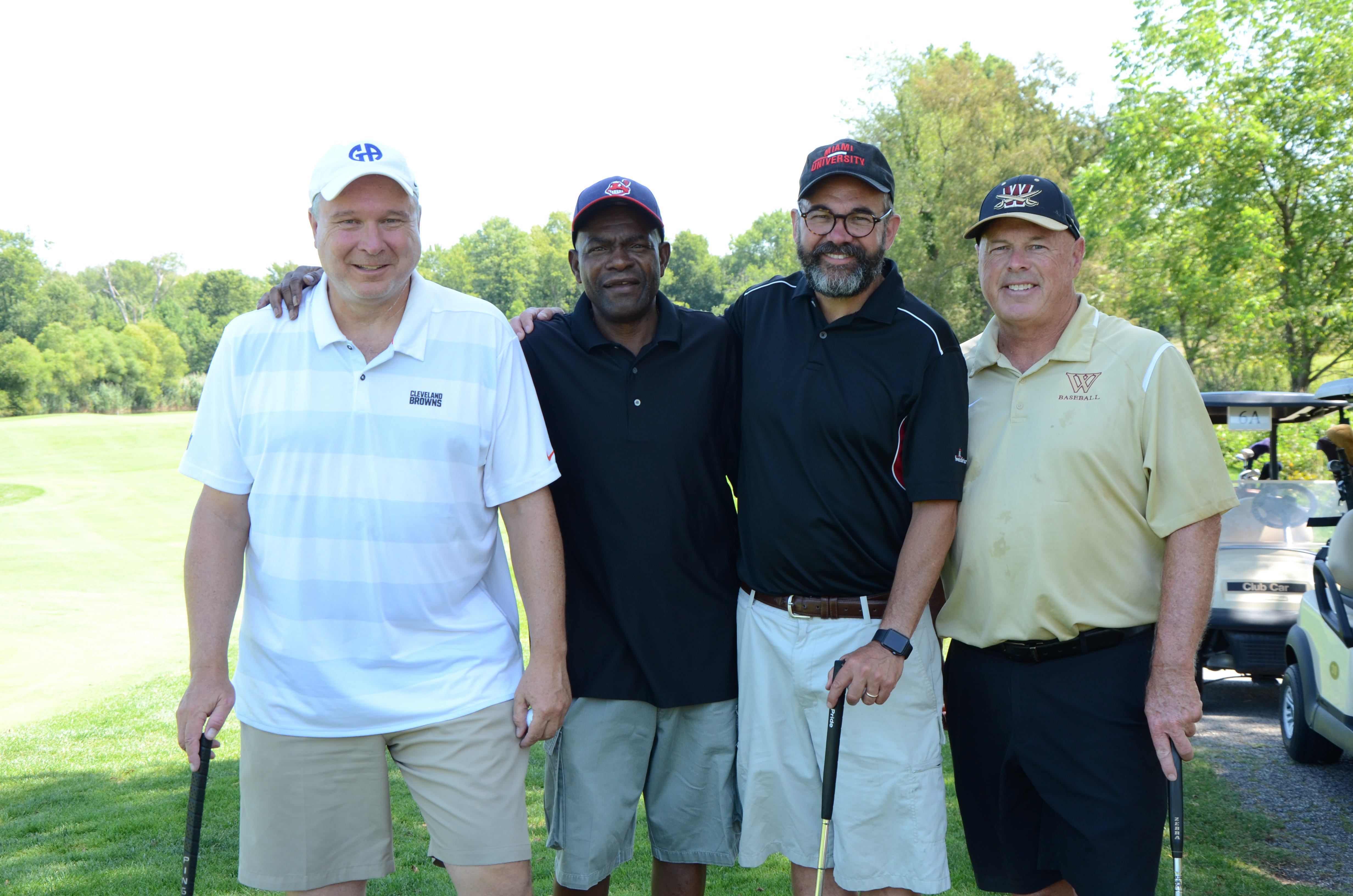 photo of four men at a golf outing