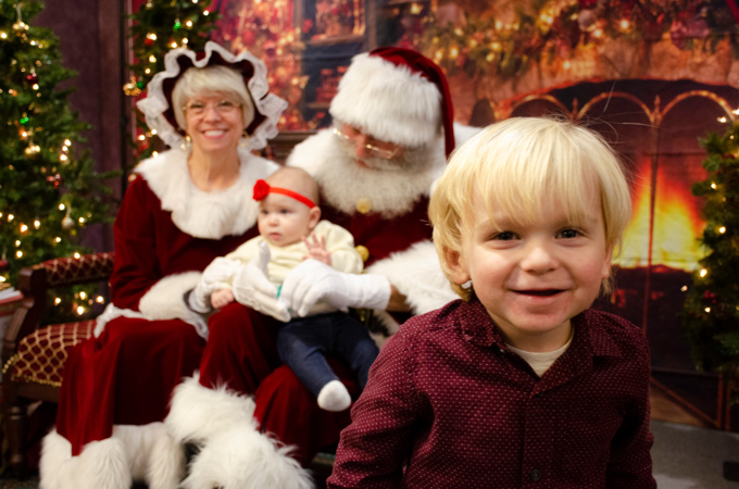 Santa and Mrs. Claus with a baby and toddler