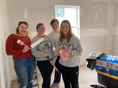 photo: Student group participating in Habitat for Humanity project