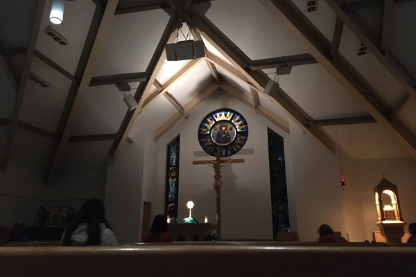 photo: Our Lady of Perpetual Help chapel interior dimly lit