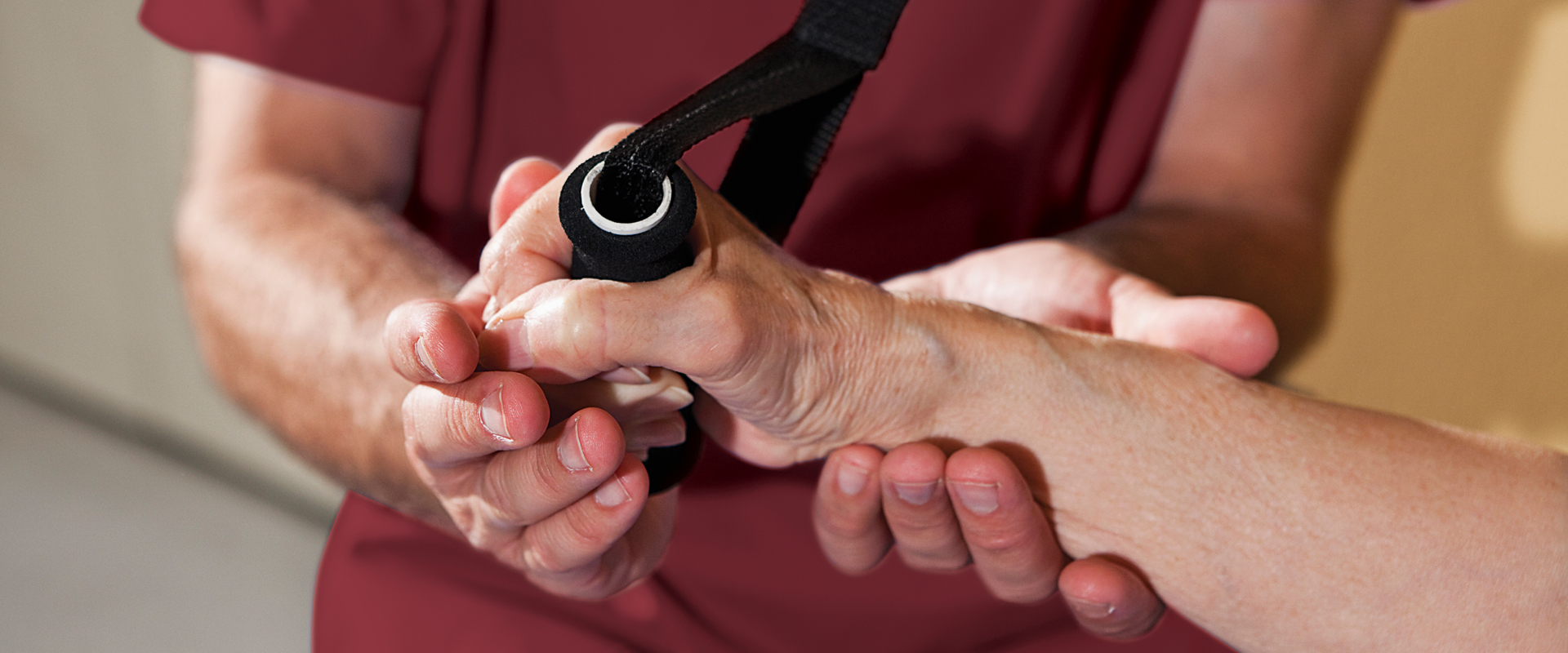 therapist and patients hands performing therapy exercise
