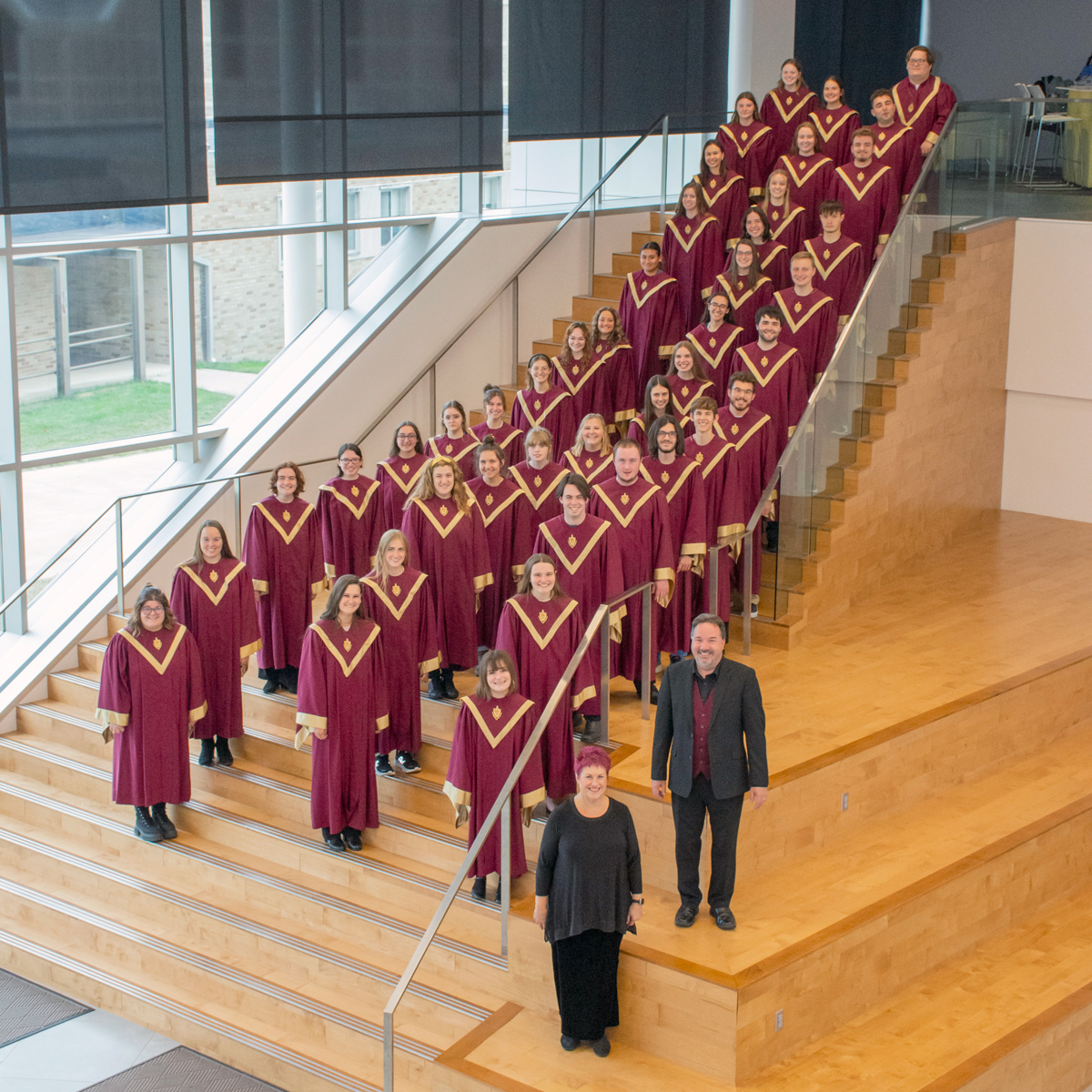 group photo of the Walsh Chorale on a stairwell