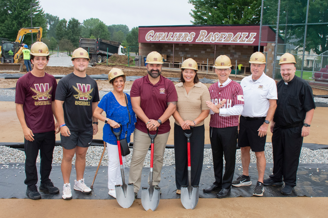 Walsh University President, Dr. Tim Collins, Head Baseball Coach, Tim Mead, University Chaplain, Fr. Ryan Furlong and Ben and Michelle Biery break ground at Biery Stadium for planned field upgrades.  