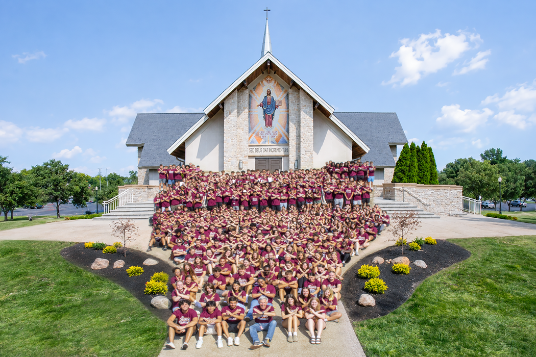 Photo of Walsh University's newest class of nearly 400 incoming Freshmen (Class of 2030) on the steps leading to the Our Lady of Perpetual Help Chapel
