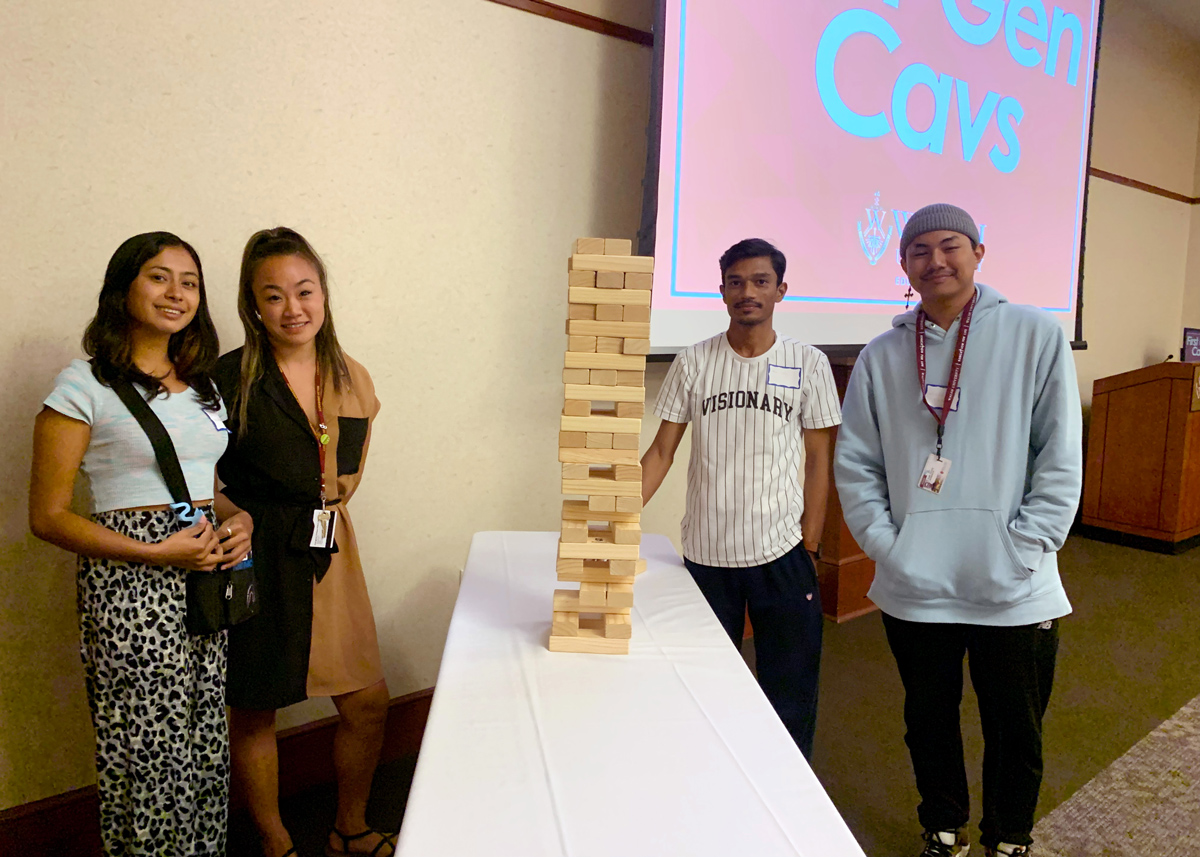 group photo of students playing a game at First Gen Cavs event