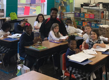 Rikwon Moore with OLOP third graders