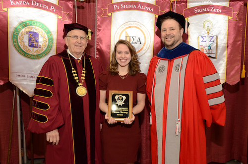 President Richard Jusseaume, Outstanding Student Theresa Chervney and Provost Dr. Douglas Palmer