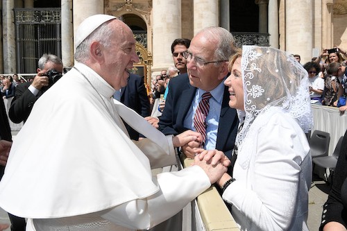 Pope Francis greets Walsh President Richard Jusseaume and First Lady Theresa