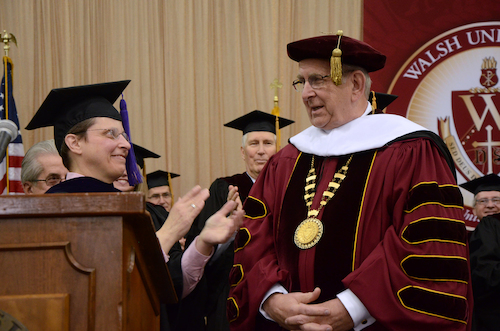 Board President the Honorable Sara Lioi presents President Richard Jusseaume with the Walsh Honorary Doctorate