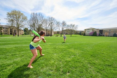 photo: students playing whiffle ball