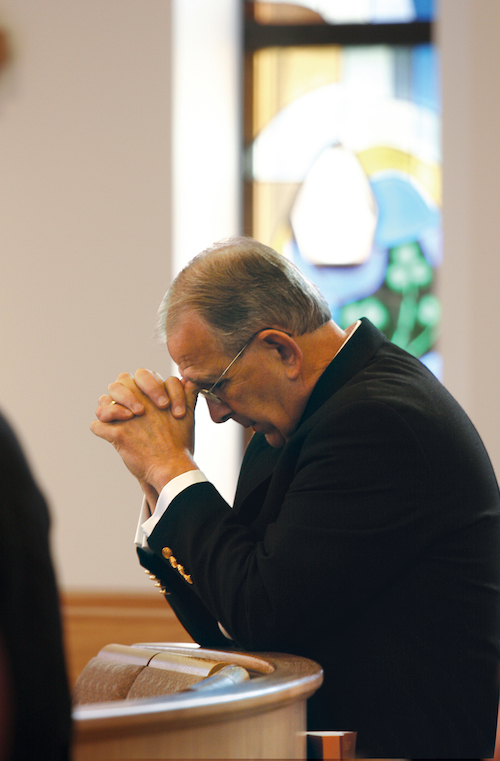 President Richard Jusseaume in Prayer